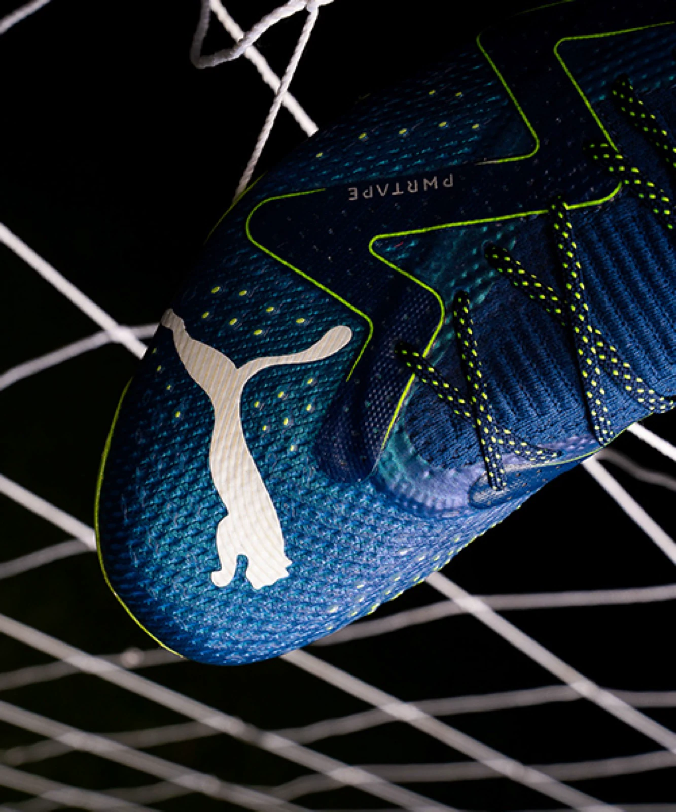 Still from the Puma spot produced by ZerezoFilms: close-up of the blue boot against the goal net